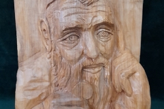 22.Miroslaw Pasewicz Zyd z moneta plaskorzezba w drewnie 40cm